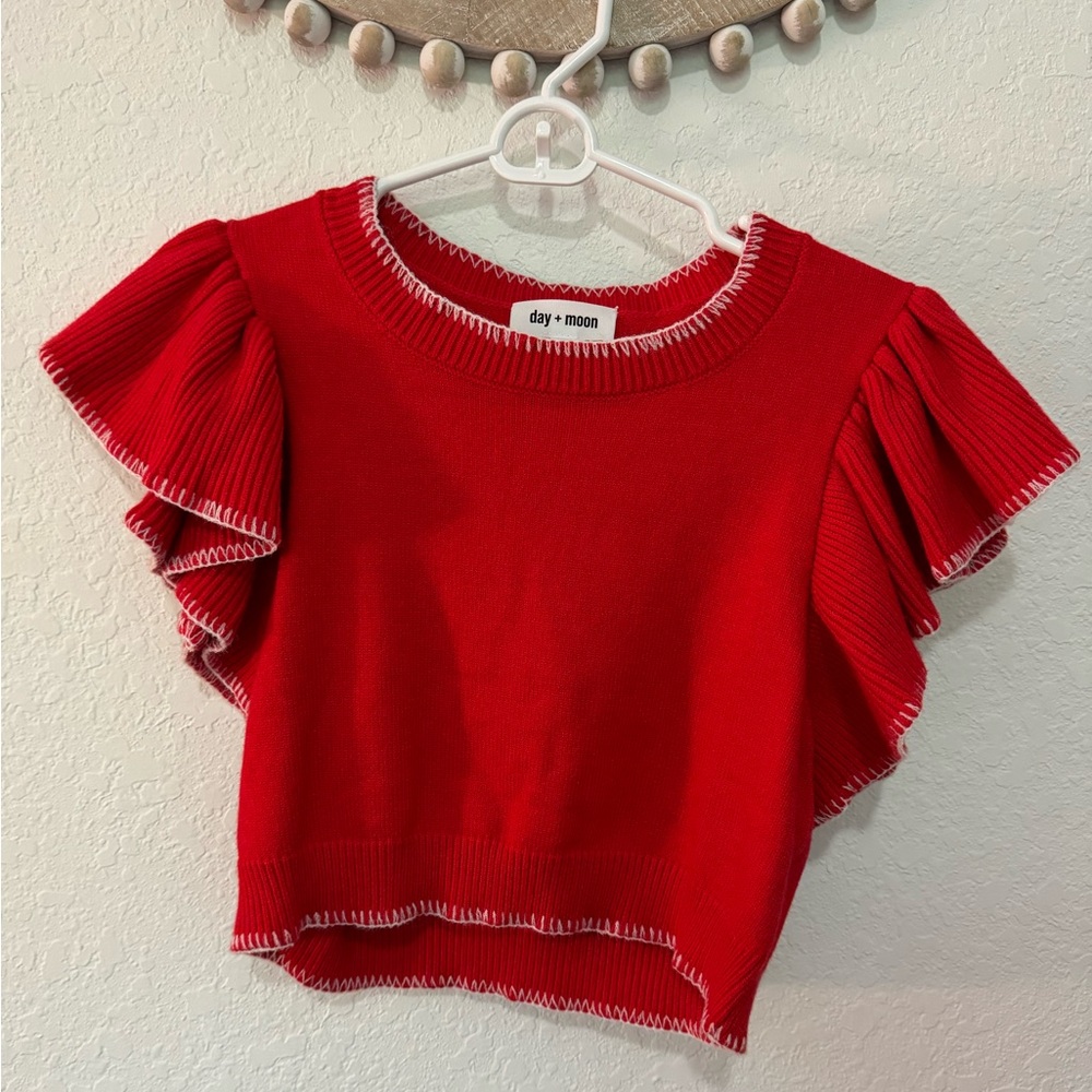 Ruffled sleeve sweater top
